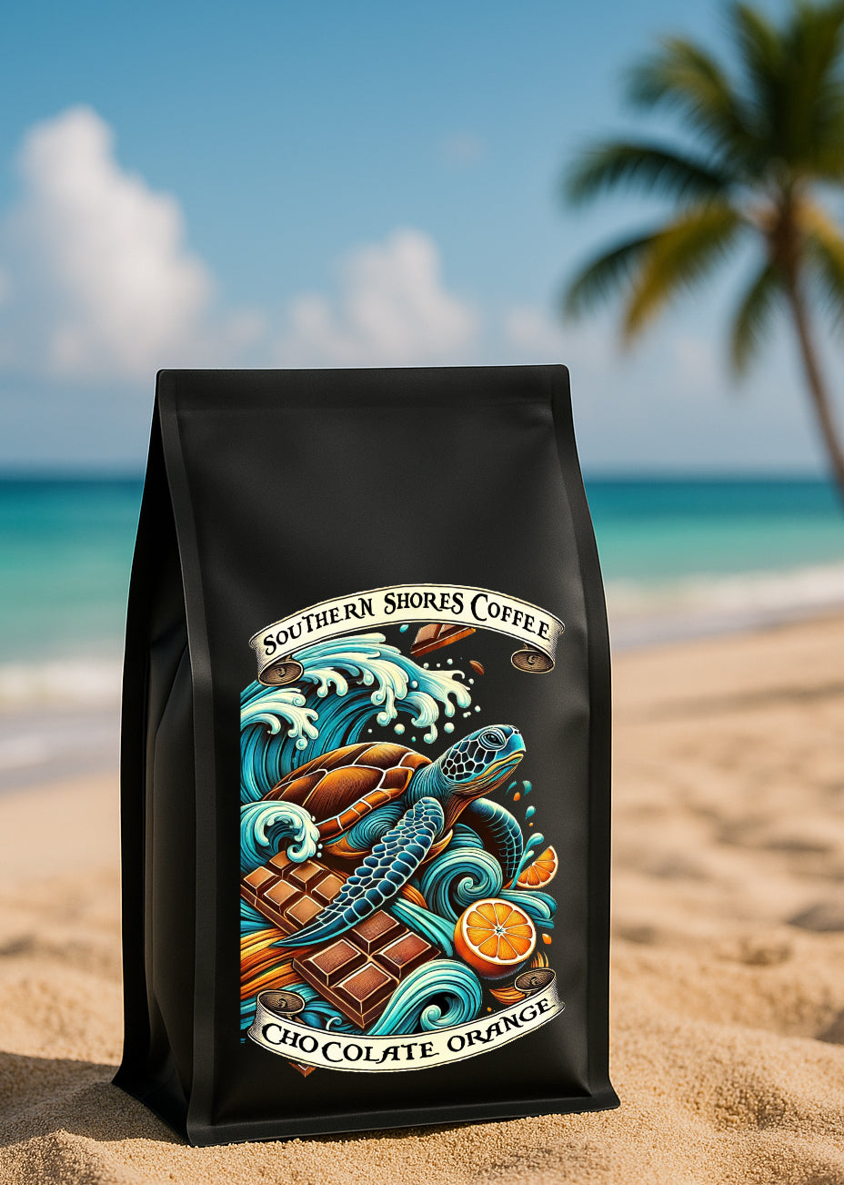 Chocolate orange coffee on a sandy beach.