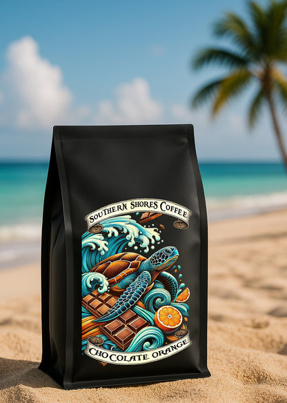 Chocolate orange coffee on a sandy beach.